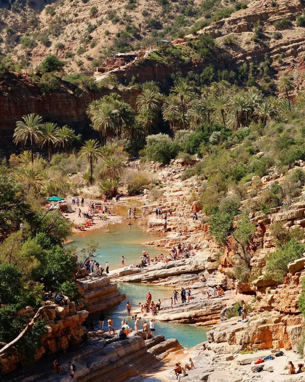 Paradise Valley bei Taghazout: Palmen und natürliche Pools zwischen roten Felswänden